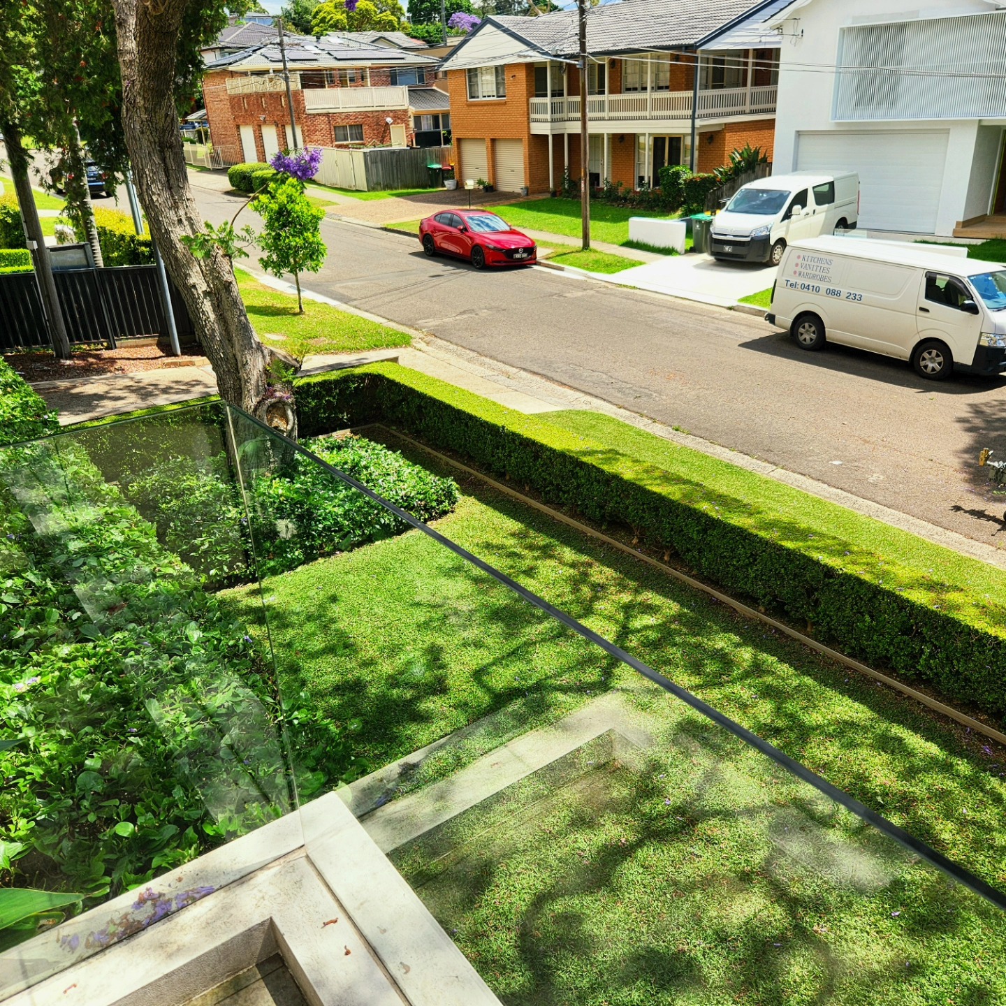 Heritage home with formal hedging and jacaranda — Haberfield, Inner West
